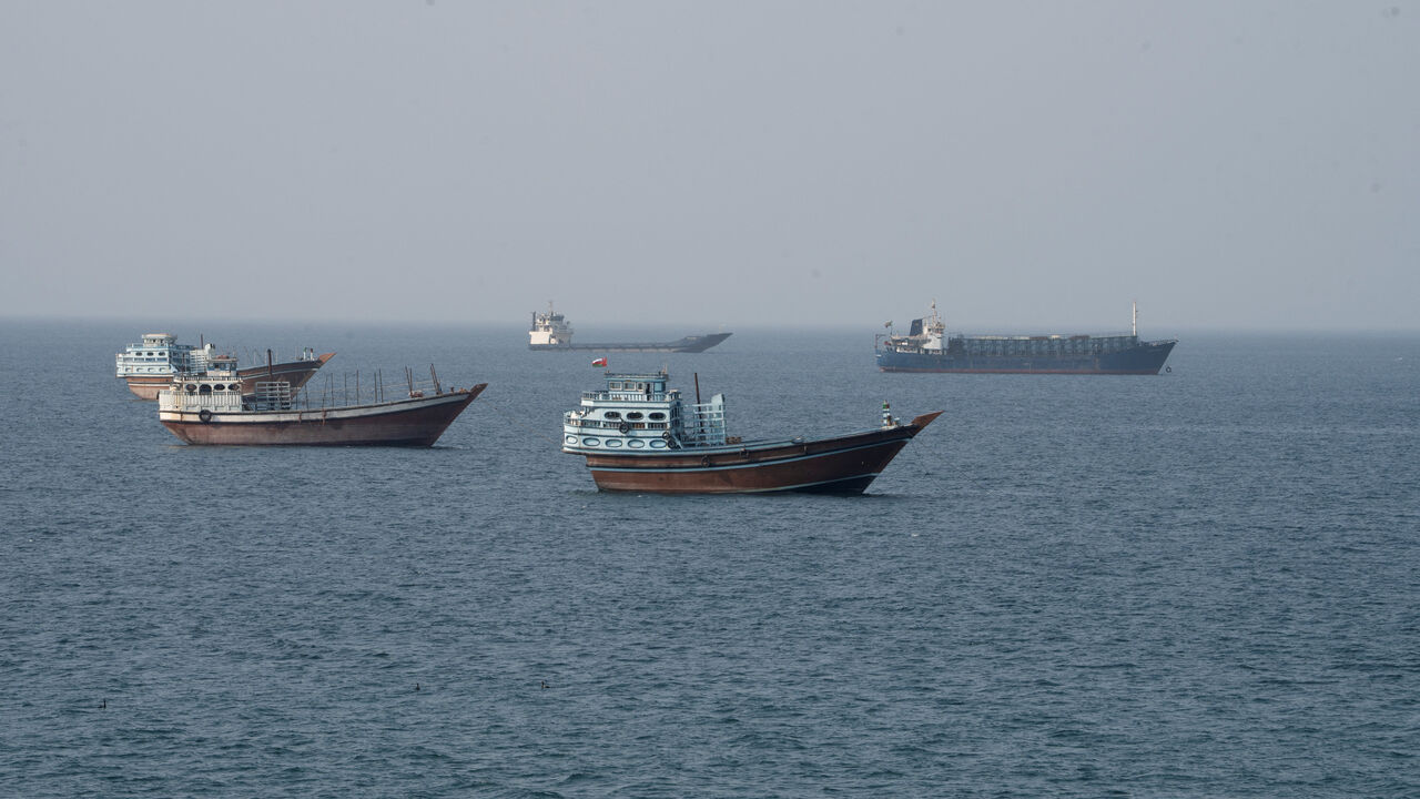 Vessels near the Strait of Hormuz, as seen from Musandam, Oman, August 17, 2026. REUTERS/Stringer