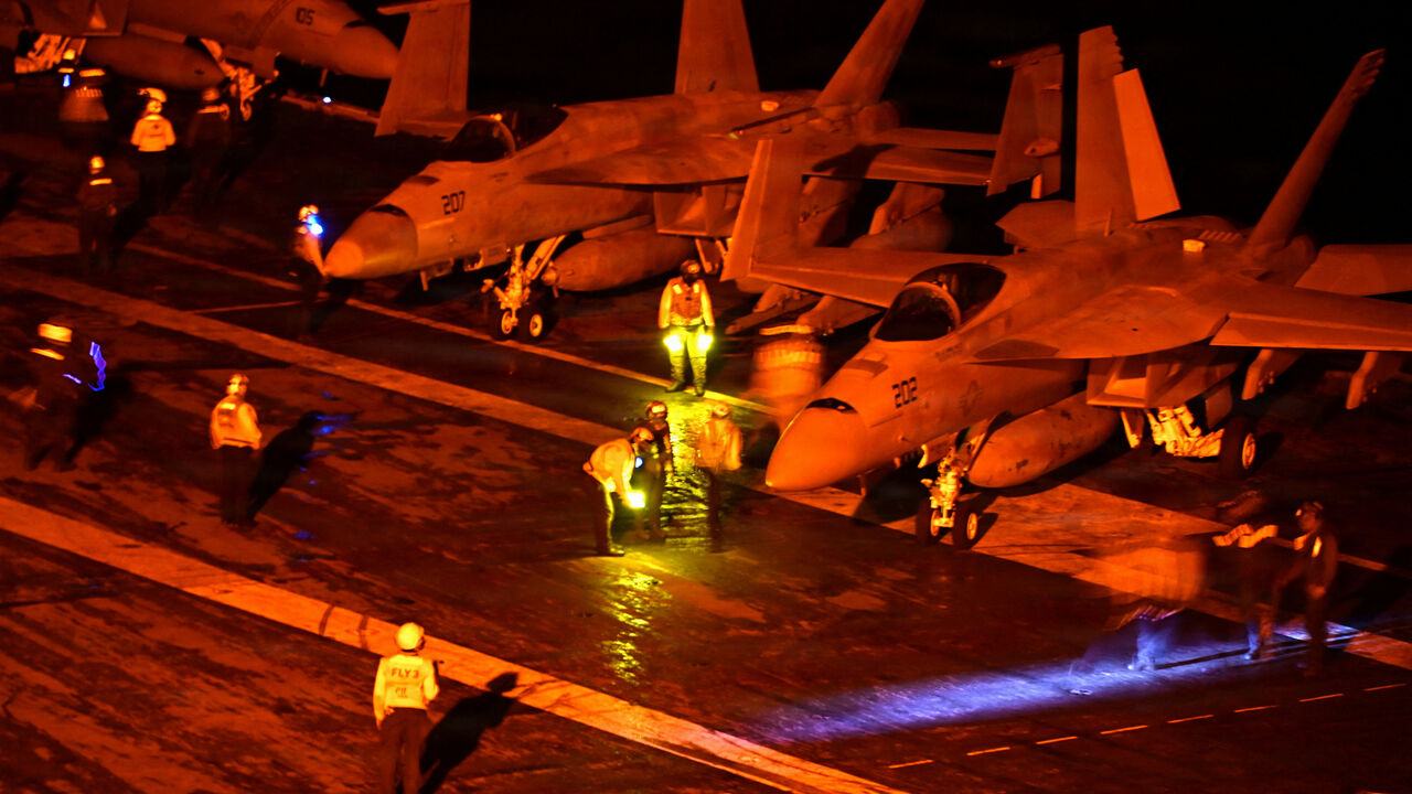 F/A-18 Super Hornets stand ready for launch on the flight deck of U.S. Navy Nimitz-class aircraft carrier USS George Washington, en route to support U.S. military operations in the war with Iran, while operating in the Indian Ocean August 18, 2026. U.S. Navy/Chief Mass Communication Specialist Joshua Karsten/Handout via REUTERS