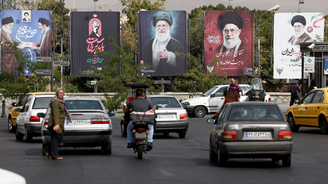 Banners with pictures of the late Supreme Leader of Iran, Ayatollah Ali Khamenei, are displayed on a street in Tehran, Iran, August 22, 2026. Majid Asgaripour/WANA (West Asia News Agency) via REUTERS