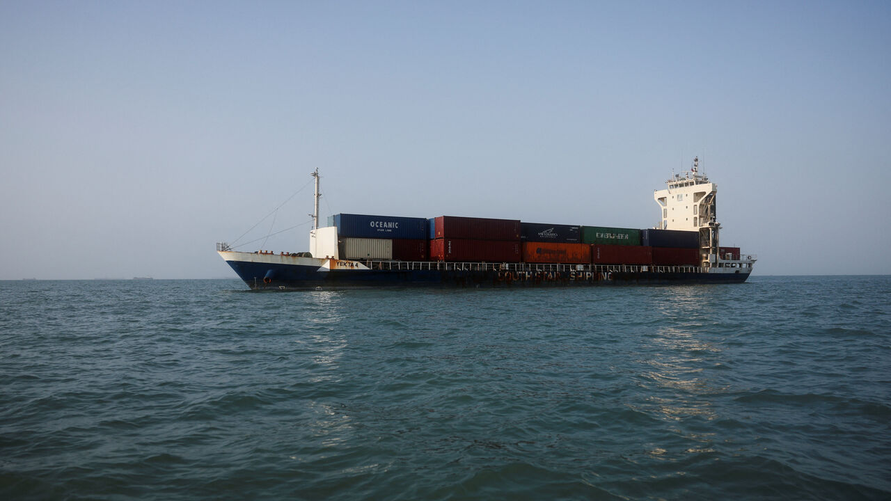 A vessel in the Strait of Hormuz visible near the beach of Bandar Abbas, Iran, August 27, 2026. Majid Asgaripour/WANA (West Asia News Agency) via REUTERS