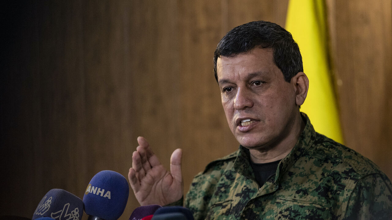 Syrian Democratic Forces (SDF) commander-in-chief Mazloum Kobane speaks during a press conference in Syria's northeastern city of Hasakeh on Dec. 6, 2024. 