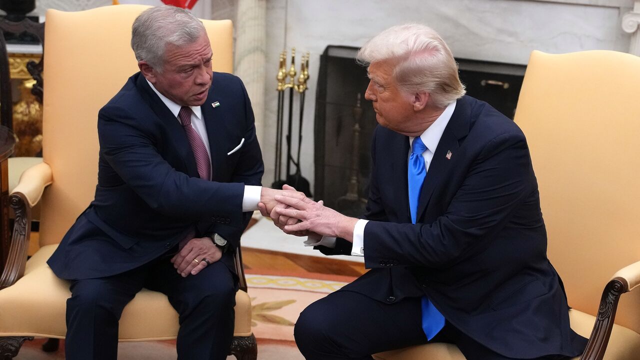 US President Donald Trump (R) meets with Jordanian King Abdullah II in the Oval Office of the White House, Washington, DC, Feb. 11, 2025.