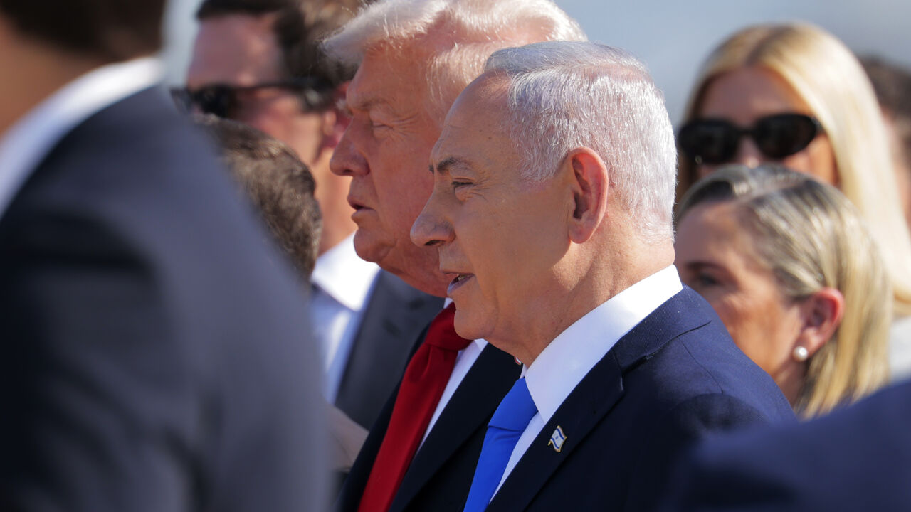 US President Donald Trump (C) is welcomed by Israeli Prime Minister Benjamin Netanyahu at Ben Gurion International Airport on Oct. 13, 2025 in Tel Aviv, Israel. 
