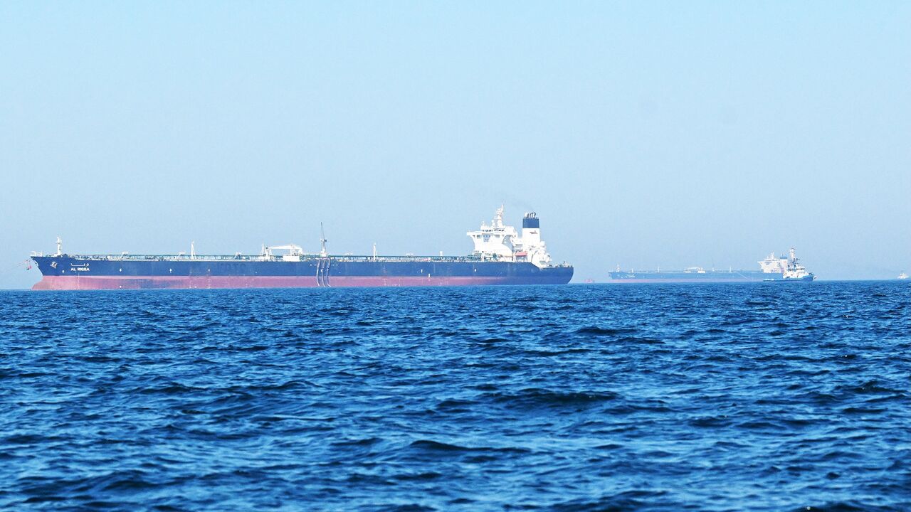 The Al-Riqqa oil tanker (L) and Al-Yarmouk oil tankers sail in the Arabian Gulf waters, off the coast of Kuwait City on June 27, 2026. 