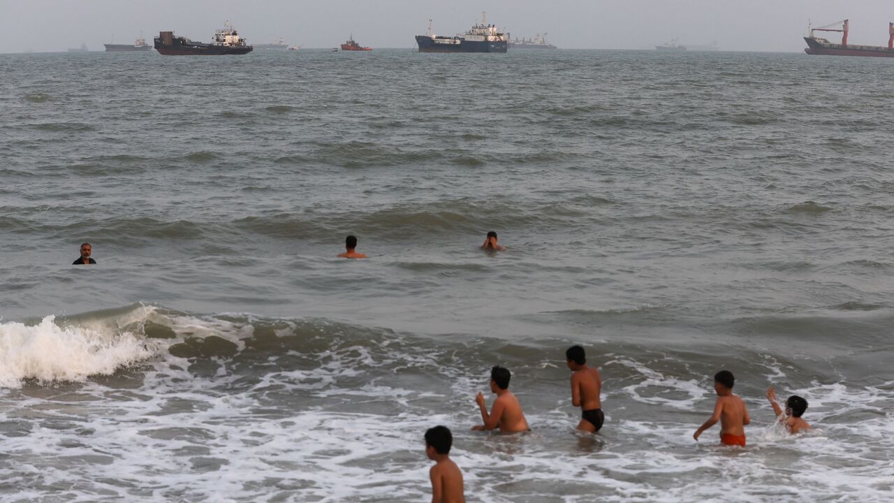 Children swimming in the Strait of Hormuz