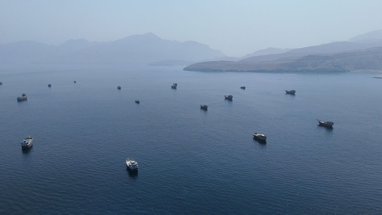 FILE PHOTO: A drone view shows vessels near the Strait of Hormuz, as seen from Musandam, Oman, August 28, 2026. REUTERS/Stringer/File Photo