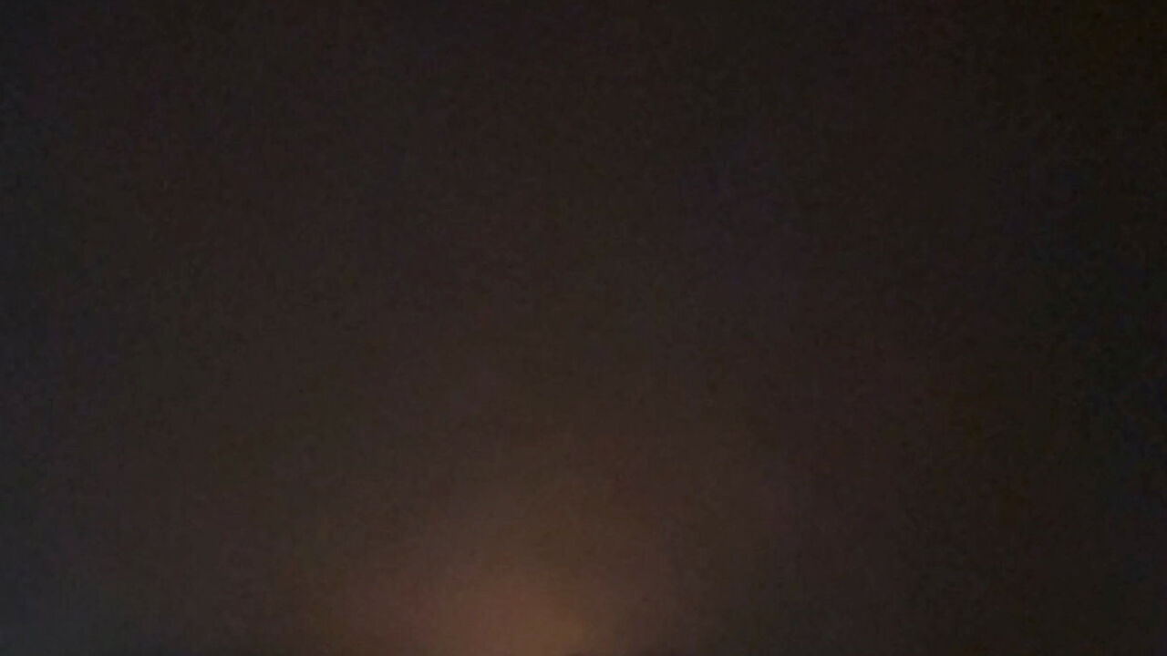 A flash of light rises from the ground after an apparent projectile streaks across the sky and appears to reach the ground over Jordan as seen from Eilat, Israel, September 1, 2026, in this screengrab obtained from a video. Video obtained by Reuters