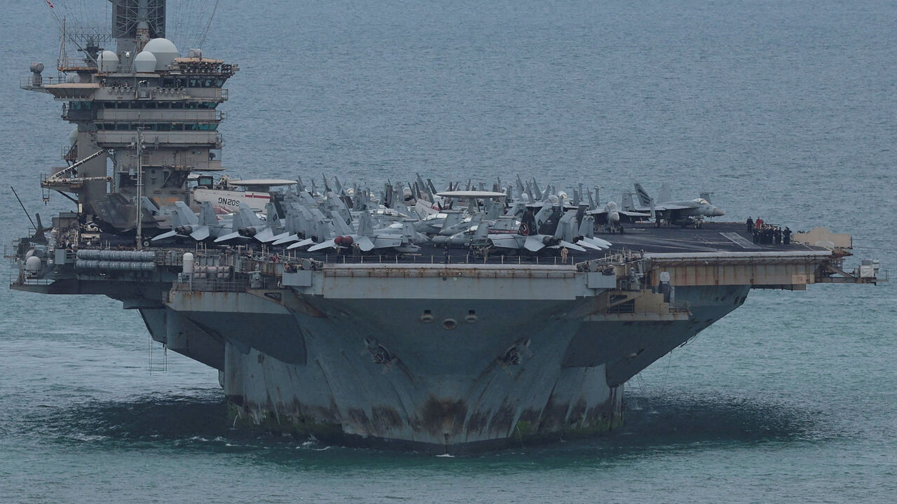 The U.S. Navy Nimitz-class aircraft carrier USS Abraham Lincoln sails toward Laem Chabang Port before docking for a rest stop following a long deployment in the Middle East, in Chonburi province, Thailand, September 2, 2026. REUTERS/Chalinee Thirasupa     TPX IMAGES OF THE DAY
