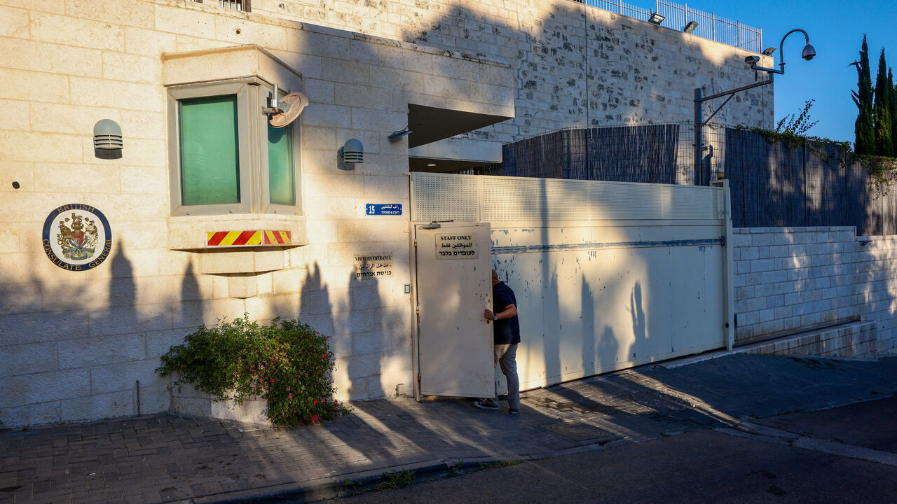 A person enters the British Consulate, on the day Israeli Foreign Minister Gideon Saar said he would close it in response to trade sanctions imposed by British Prime Minister Andy Burnham against Israeli settlements in the occupied West Bank, in Jerusalem, September 8, 2026. REUTERS/Jamal Awad