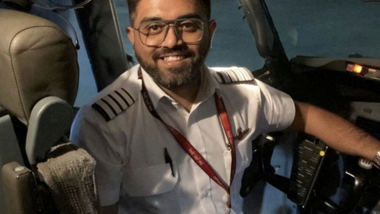 Indian pilot Smit Machchhar smiles in an unidentified location