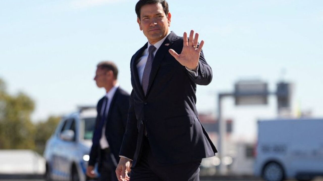 US Secretary of State Marco Rubio steps off a plane at Lisbon Airport