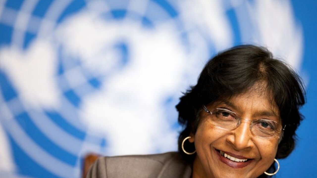 FILE PHOTO: U.N. High Commissioner for Human Rights Navi Pillay addresses a news conference on the situation in Tunisia at the European headquarters of the United Nations in Geneva