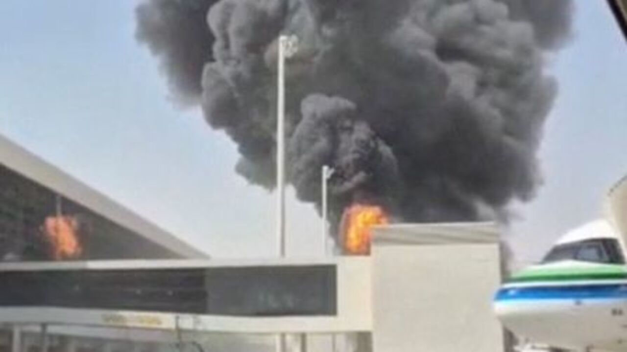 Smoke and flames rise from King Khalid Airport, after Yemen’s Iran-backed Houthis said they attacked the airport, in Riyadh