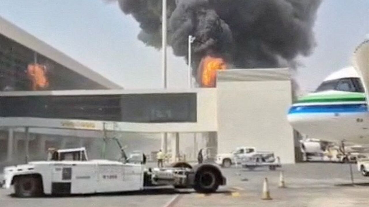 FILE PHOTO: Smoke and flames rise from King Khalid Airport, after Yemen's Iran-backed Houthis said they attacked the airport, in Riyadh