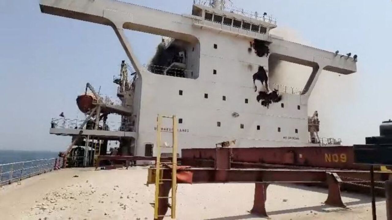 Damage on the superstructure while smoke rises from the bulk carrier vessel Cape Dao after an attack at sea