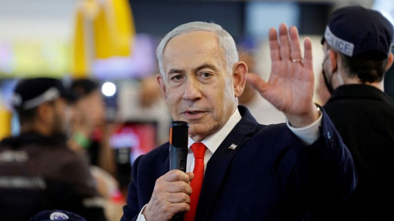 FILE PHOTO: Israeli Prime Minister Benjamin Netanyahu meets members of the public in Ramla