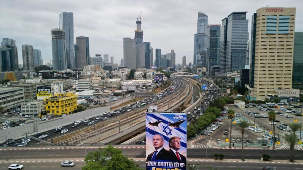 A drone view of an election campaign display for Israeli Prime Minister Benjamin Netanyahu's Likud party, depicting Netanyahu and US President Donald Trump, in Tel Aviv