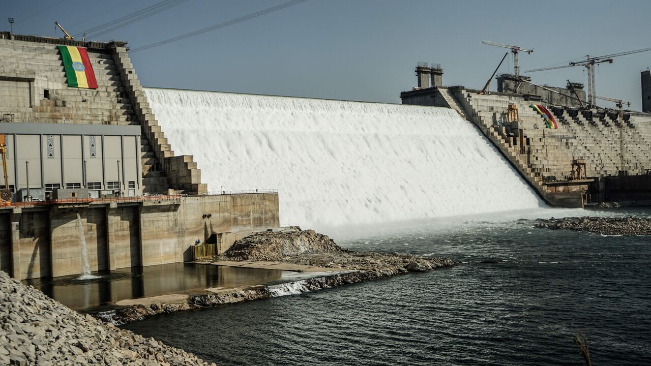 This general view shows the site of the Grand Ethiopian Renaissance Dam (GERD) in Guba, Ethiopia, on February 19, 2022. - Ethiopia's massive hydro-electric dam project on a tributary of the Nile has raised regional tensions notably with Egypt, which depends on the huge river for 97 percent of its water supply. Government officials said the dam would begin producing electricity on Sunday, more than a decade since work first started. (Photo by Amanuel SILESHI / AFP) (Photo by AMANUEL SILESHI/AFP via Getty Ima