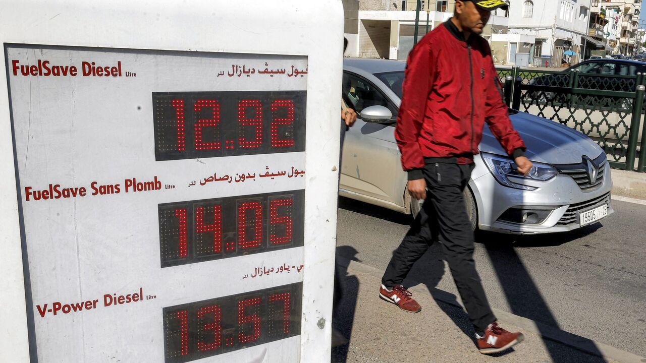 Fuel prices are displayed at a petrol station in Rabat