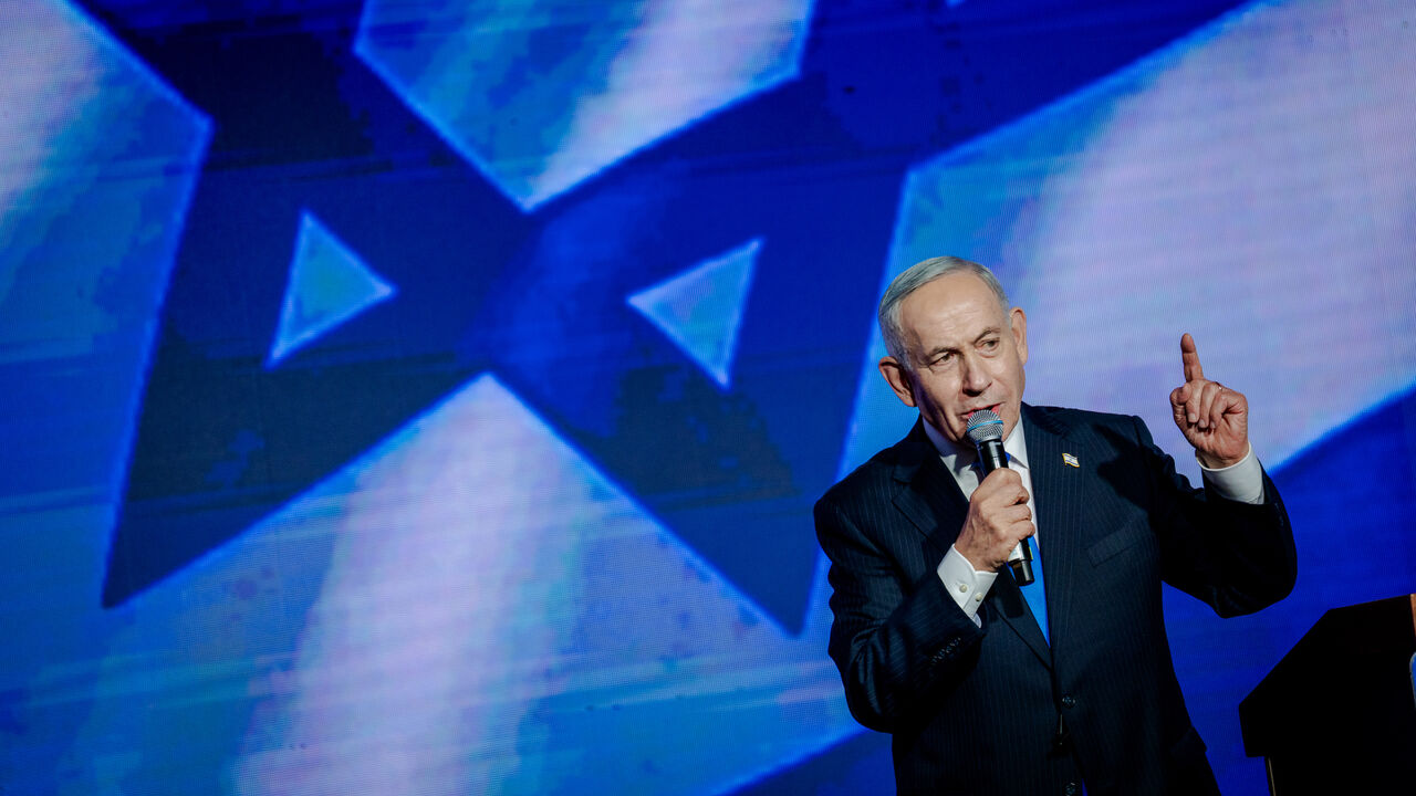 Israeli Prime Minister and Likud party leader Benjamin Netanyahu speaks to supporters at the lectern during a party campaign rally at Expo Tel Aviv on Sept. 17, 2026 in Tel Aviv, Israel. 