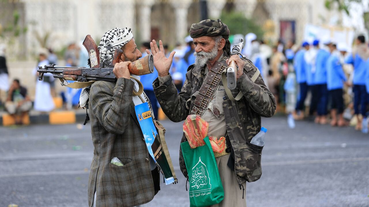 Supporters of the Houthi authorities hold their weapons during a protest against the Saudi intervention in Yemen and against Saudi Arabia's recent accusation that the Houthis fired at the holy city of Mecca, in Sanaa, on Sept. 18, 2026. 