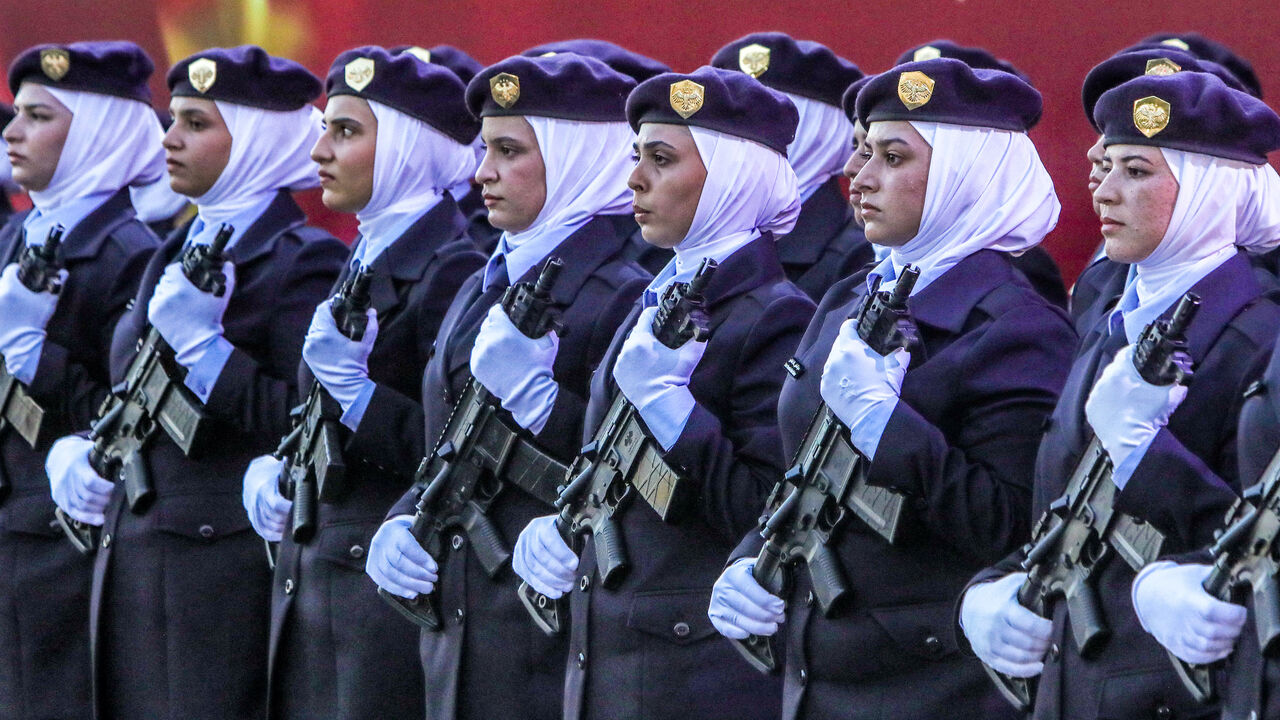 New female cadets from the new women's police academy attend the first cohort graduation ceremony after completing a six-month training program, in al-Tal on the northern outskirts of Damascus, on Sept. 22, 2026.
