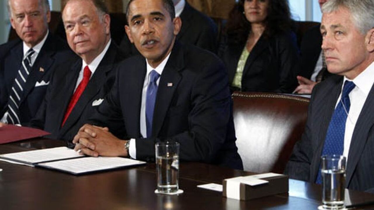 OBAMA/ U.S. President Barack Obama (2nd R) and Vice President Joe Biden (L) meet with co-chairmen of the President's Intelligence Advisory Board former Senator Chuck Hagel (R-NE) (R) and former Senator David Boren (D-OK) and senior leadership of the intelligence community in the Cabinet Room at the White House in Washington October 28, 2009. REUTERS/Jim Young (UNITED STATES POLITICS)