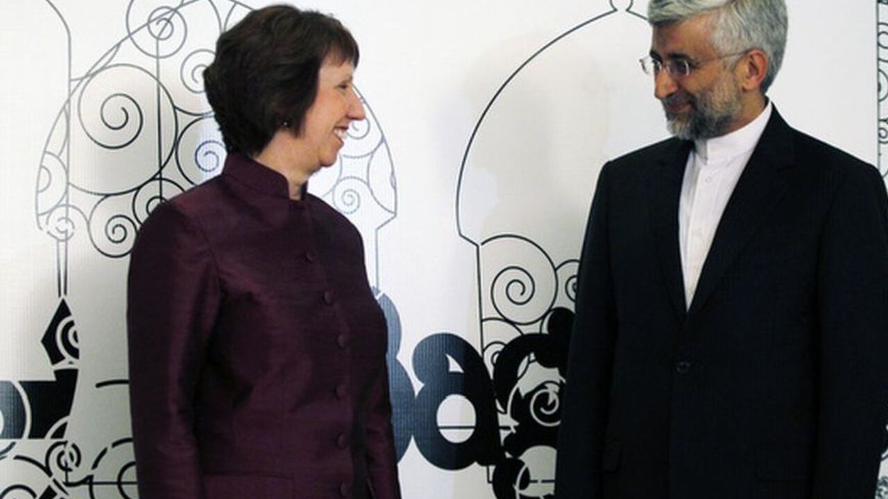 European Union foreign policy chief Ashton and Iran's chief negotiator Jalili pose for the media before their meeting in Baghdad European Union foreign policy chief Catherine Ashton (L) and Iran's chief negotiator Saeed Jalili pose for the media before their meeting in Baghdad May 23, 2012. REUTERS/Thaier al-Sudani (IRAQ - Tags: POLITICS)