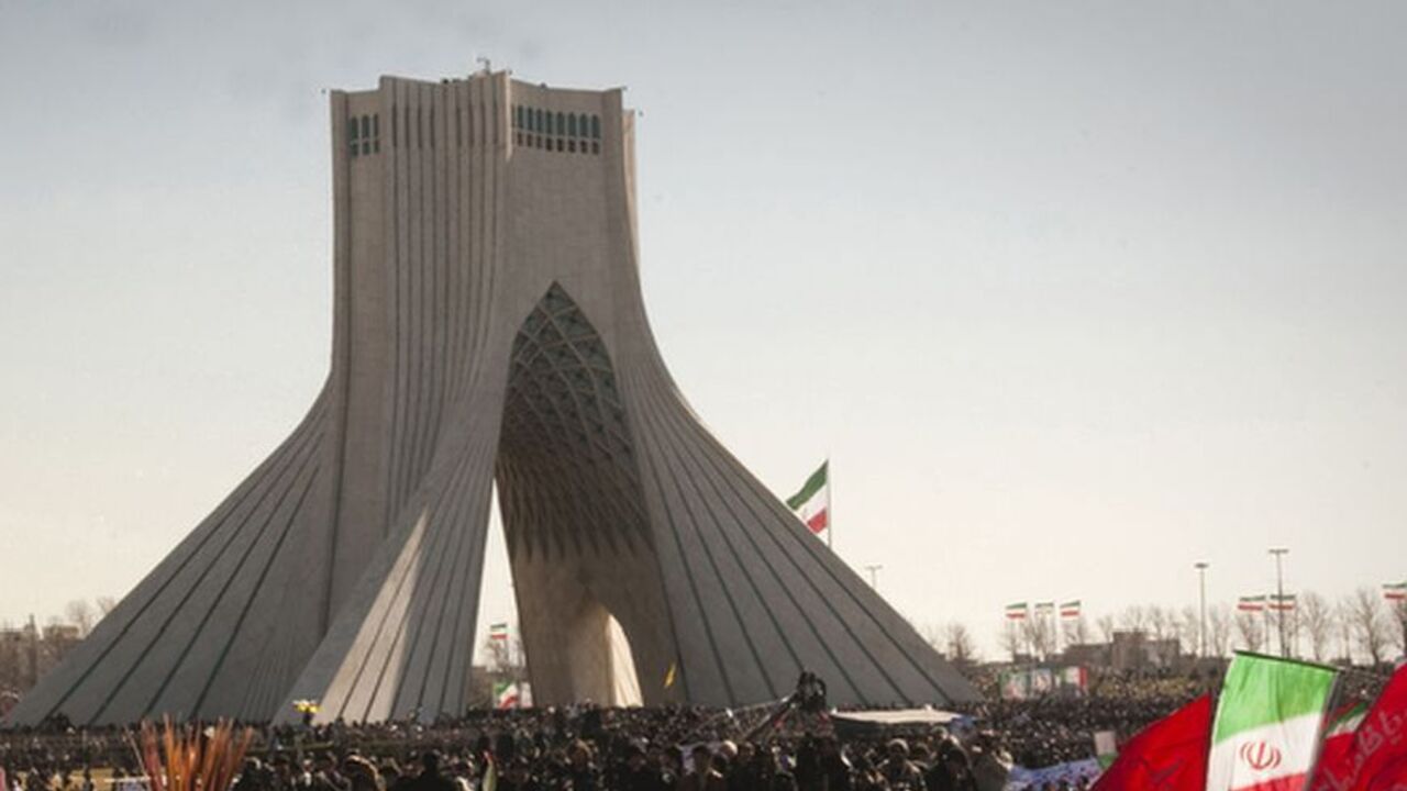 Iran's President Mahmoud Ahmadinejad speaks during a ceremony to mark the 33rd anniversary of the Islamic Revolution, in Tehran EDITORS' NOTE: Reuters and other foreign media are subject to Iranian restrictions on leaving the office to report, film or take pictures in Tehran.
Iran's President Mahmoud Ahmadinejad speaks during a ceremony to mark the 33rd anniversary of the Islamic Revolution, in Tehran's Azadi square February 11, 2012. Ahmadinejad said on Saturday the Islamic Republic would soon announce "very important" achievements in the nuclear field, state TV reported. REUTERS/Raheb Homavandi (IRAN - Tags: ANNIVERSARY POLI