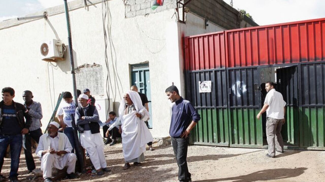 Families of imprisoned Gaddafi loyalists gather outside a prison in the Tajura area of Tripoli Families of imprisoned Gaddafi loyalists gather outside a prison in the Tajura area of Tripoli November 3, 2011. The families are calling for the release of their family members. REUTERS/Ismail Zitouny (LIBYA - Tags: POLITICS CRIME LAW SOCIETY)