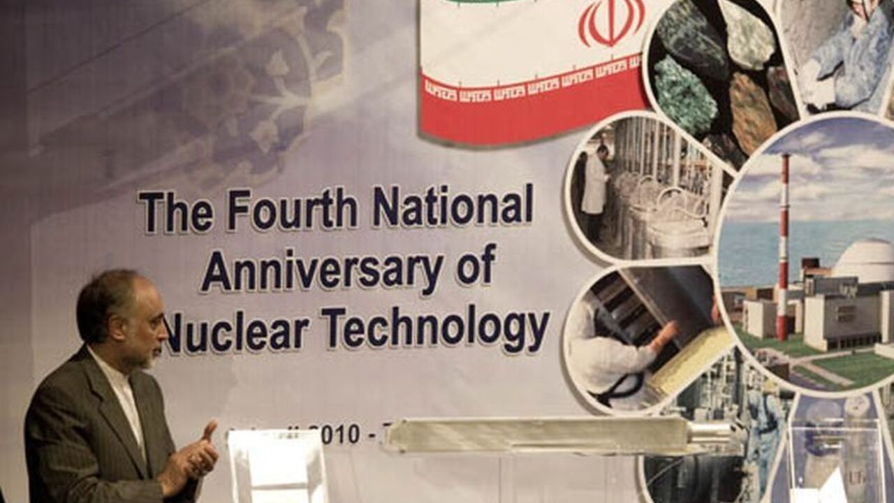 IRAN-NUCLEAR/ EDITORS' NOTE: Reuters and other foreign media are subject to Iranian restrictions on leaving the office to report, film or take pictures in Tehran.
Ali Akbar Salehi, head of Iran's Atomic Energy Organisation, claps as he looks at an object representing nuclear fuel which will be used in Tehran's research reactor during a ceremony to mark the Fourth National Anniversary of Nuclear Technology, in Tehran April 9, 2010. Iran announced Friday it had developed faster centrifuges for uranium enrichment, signall