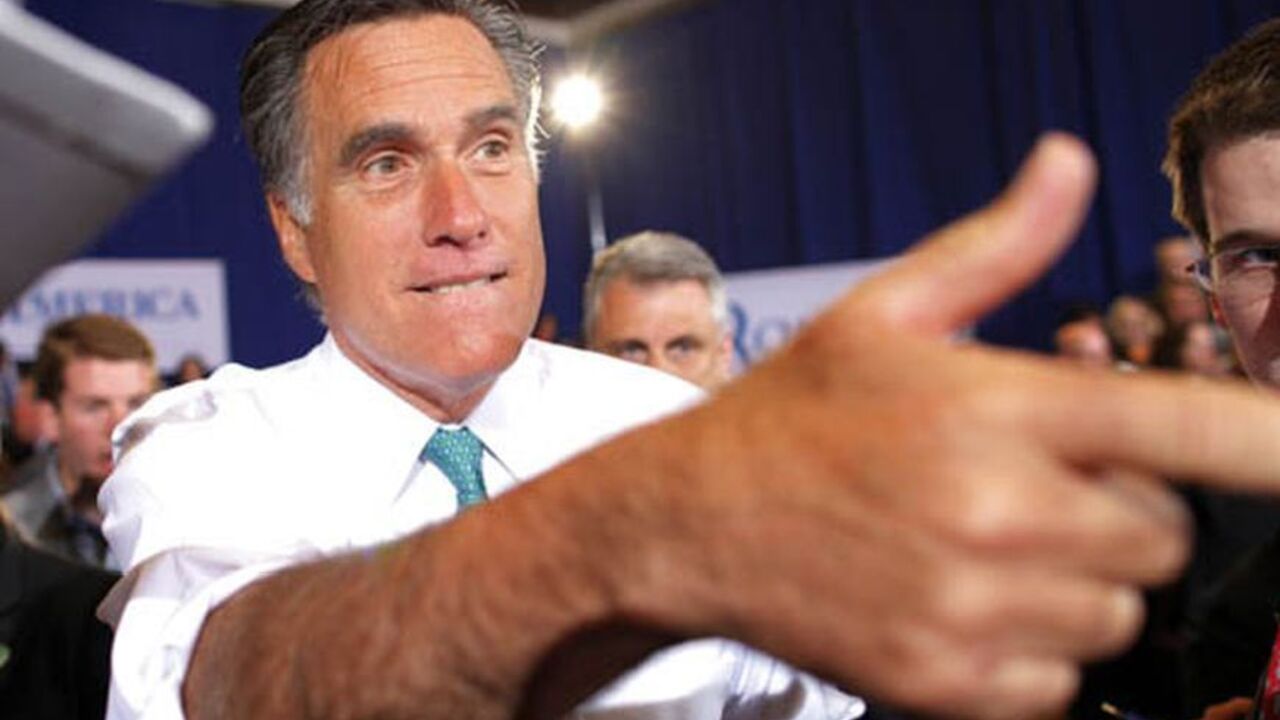 USA-CAMPAIGN/ROMNEY U.S. Republican presidential candidate and former Massachusetts Governor Mitt Romney greets audience members during a campaign stop in Warwick, Rhode Island April 11, 2012. REUTERS/Brian Snyder (UNITED STATES - Tags: POLITICS ELECTIONS)