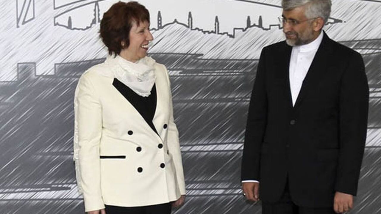NUCLEAR-IRAN/TALKS European Union foreign policy chief Catherine Ashton (L) and Iran's chief negotiator Saeed Jalili pose for media before their meeting in Istanbul April 14, 2012. World powers and Iran launched a new round of negotiations in Istanbul on Saturday, aiming to resolve a long-standing dispute over Tehran's nuclear programme that threatens to spark a new war in the Middle East. REUTERS/Tolga Adanali/Pool (TURKEY - Tags: POLITICS)