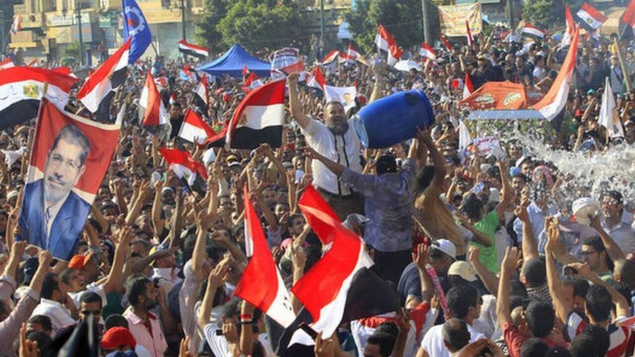 Supporters of Muslim Brotherhood's presidential candidate Mohamed Morsy celebrate his victory at the election at Tahrir Square in Cairo Supporters of Muslim Brotherhood's presidential candidate Mohamed Morsy celebrate his victory at the election at Tahrir Square in Cairo June 24, 2012. REUTERS/Ahmed Jadallah (EGYPT - Tags: POLITICS ELECTIONS)