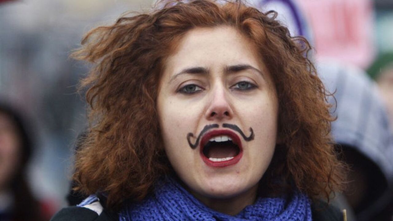 A woman shouts slogans during a demonstration to mark the International Women's Day in the Asian side of Istanbul A woman shouts slogans during a demonstration to mark the International Women's Day in the Asian side of Istanbul March 6, 2010. REUTERS/Osman Orsal (TURKEY - Tags: POLITICS CIVIL UNREST SOCIETY)
