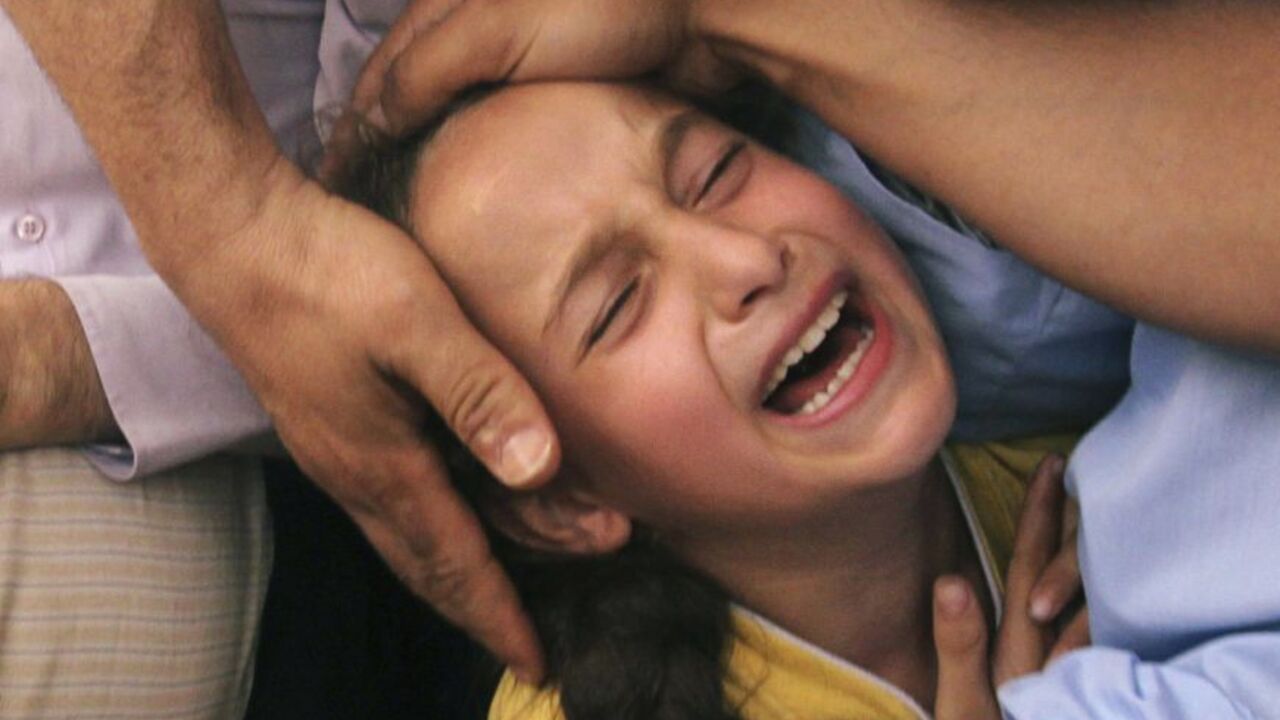 The daughter of Al-Baik, a Palestinian militant from the armed wing of the Hamas movement, mourns during her father's funeral in Gaza The daughter of Thair Al-Baik, a Palestinian militant from the Al-Qassam brigades, the armed wing of the Hamas movement, mourns during her father's funeral in Jabalya, in the northern Gaza Strip June 21, 2012. The bodies of two militants, including Al-Baik, were recovered on Thursday in a tunnel at a Hamas training camp which was hit by an Israeli air strike on Tuesday, Hamas sources said. REUTERS/Mohammed Salem (GAZA - Tags: POLITICS CIVIL UNREST)