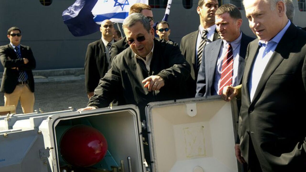 Nic554670 Israeli Prime Minister Benjamin Netanyahu (R) and Defence Minister Ehud Barak examine a C-704 anti-ship missile at the southern port of Ashdod on March 16, 2011 as Israel displayed the haul of weapons it discovered on a seized ship it says was carrying arms being smuggled from Iran to Palestinian militants in the Gaza Strip. AFP PHOTO /JACK GUEZ (Photo credit should read JACK GUEZ/AFP/Getty Images)