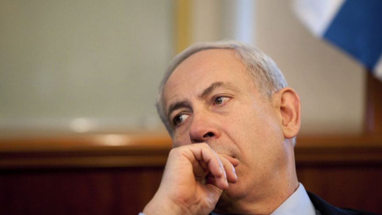 Israel's Prime Minister Netanyahu attends the weekly cabinet meeting in Jerusalem Israel's Prime Minister Benjamin Netanyahu attends the weekly cabinet meeting in Jerusalem July 8, 2012. Netanyahu gave the green light on Sunday to reforms that would end blanket military exemptions for ultra-Orthodox Jewish men, in an about-face only hours after 20,000 Israelis marched for change. REUTERS/Uriel Sinai/Pool (JERUSALEM - Tags: POLITICS MILITARY)