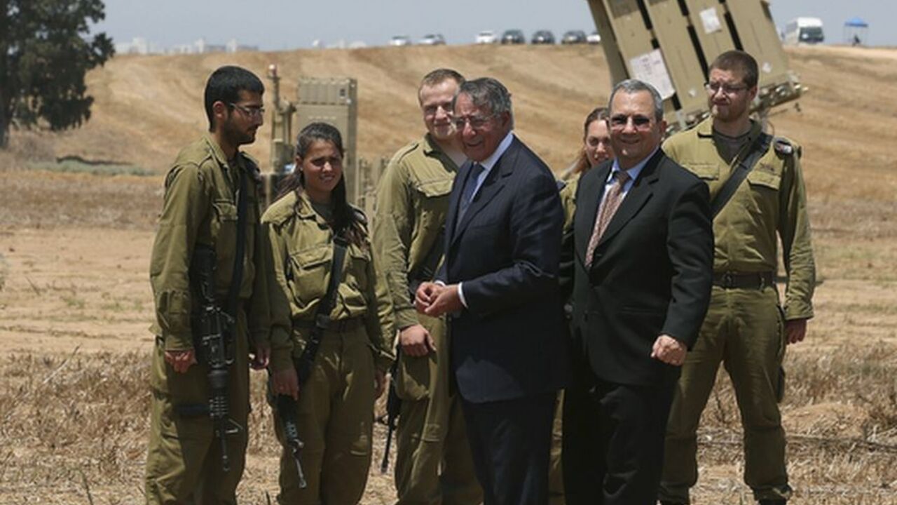 U.S. Defense Secretary Panetta and Israeli Defense Minister Barak greet Israeli soldiers after a joint news conference during a visit to the Iron Dome defense system launch site in Ashkelon U.S. Defense Secretary Leon Panetta and Israeli Defense Minister Ehud Barak (front, R) greet Israeli soldiers after a joint news conference during a visit to the Iron Dome defense system launch site in Ashkelon August 1, 2012. Israel told Panetta on Wednesday that time was running out for a peaceful settlement to the nuclear dispute with Iran because sanctions and tough talk over possible military action were failing to sway Tehran. The Iron Dome was designed to intercept and destroy short-range shells and
