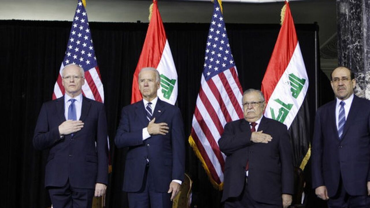 James Jeffrey, Joe Biden, Nuri al-Maliki and Jalal Talabani stand for the national anthem during one of several planned ceremonies to mark the end of American military presence in Iraq, in Baghdad U.S. Ambassador to Iraq James Jeffrey (L), U.S. Vice President Joe Biden (2nd L), Iraq's Prime Minister Nuri al-Maliki (R) and Iraq's President Jalal Talabani stand for the national anthem during one of several planned ceremonies to mark the end of American military presence in Iraq, in Baghdad December 1, 2011. The last 13,000 U.S. troops will pull out of Iraq by the end of the year. Violence in the country has dropped sharply since the heights of sectarian slaughter in 2006-2007, but at least 10 people we