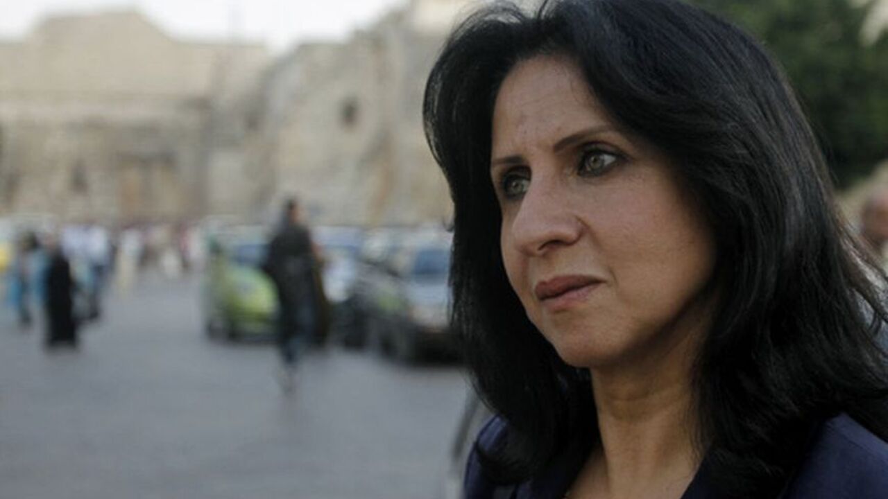 Vera Baboun stands near the Church of the Nativity in Bethlehem Vera Baboun stands near the Church of the Nativity in the West Bank town of Bethlehem October 7, 2012. Baboun, a university lecturer, is aiming to become the first female mayor of the Palestinian town, and in the process shake up a society where men still make the laws and do the deals. She has a good chance of achieving the first goal in municipal elections being held across the West Bank on Oct. 20. Picture taken October 7, 2012. To match Feature PALESTINIANS-ELECTIONS/WOMEN REUTERS/Mohamad Torokman (WES