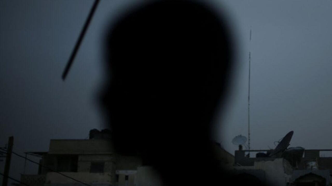 Palestinian flag flutters as a Palestinian boy stands atop the rubble of a destroyed house in the northern Gaza Strip A Palestinian flag flutters as a Palestinian boy stands atop the rubble of a house, which witnesses said was destroyed in an Israeli air strike during an eight-day conflict, in the northern Gaza Strip December 20, 2012. Eight days of Israeli air strikes on Gaza and cross-border Palestinian rocket attacks ended in an Egyptian-brokered truce agreement last month calling on Israel to ease restrictions on the territory. REUTERS/Mohammed Salem (GAZA - Tags: CONFLICT)