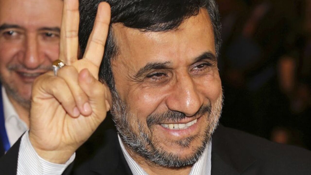 Iranian President Ahmadinejad gestures to photographers after meeting Indonesian counterpart Yudhoyono in Nusa Dua Iranian President Mahmoud Ahmadinejad gestures to photographers after meeting with Indonesian counterpart Susilo Bambang Yudhoyono in Nusa Dua, Bali November 9, 2012. Ahmadinejad said on Thursday the age of nuclear deterrence was long gone and any country still stockpiling nuclear weapons was "mentally retarded". He again denied Iran was trying to develop nuclear weapons, a day after the re-election victory of U.S. President Barack Obama, for whom Tehran's disputed nuclear programme will be one of the thorn