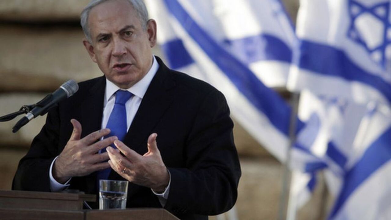 Israel's Prime Minister Benjamin Netanyahu speaks during the annual memorial ceremony for Israel's first prime minister, David Ben-Gurion, at Sde Boker Israel's Prime Minister Benjamin Netanyahu speaks during the annual memorial ceremony for Israel's first prime minister, David Ben-Gurion, at Sde Boker in southern Israel November 20, 2012. Israel wants to find a long-term, diplomatic solution to resolve the Gaza crisis, but will not hesitate to escalate its military campaign against Palestinian militants if needed, Netanyahu said on Tuesday. REUTERS/Dan Balilty/Pool (ISRAEL - Tags: POLITICS CIVIL UNREST ENVIRONMENT)