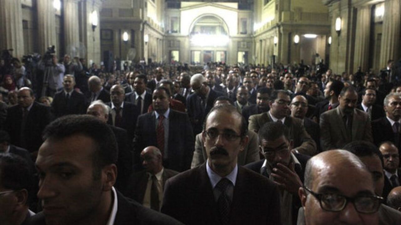 Judges attend a meeting at Egypt's Judges Club in Cairo Judges attend a meeting at Egypt's Judges Club in Cairo November 24, 2012. Egyptian President Mohamed Mursi faced a rebellion on Saturday from judges who accused him of expanding his powers at their expense, deepening a crisis that triggered calls for more protests following a day of violence across Egypt. REUTERS/Asmaa Waguih (EGYPT - Tags: POLITICS)