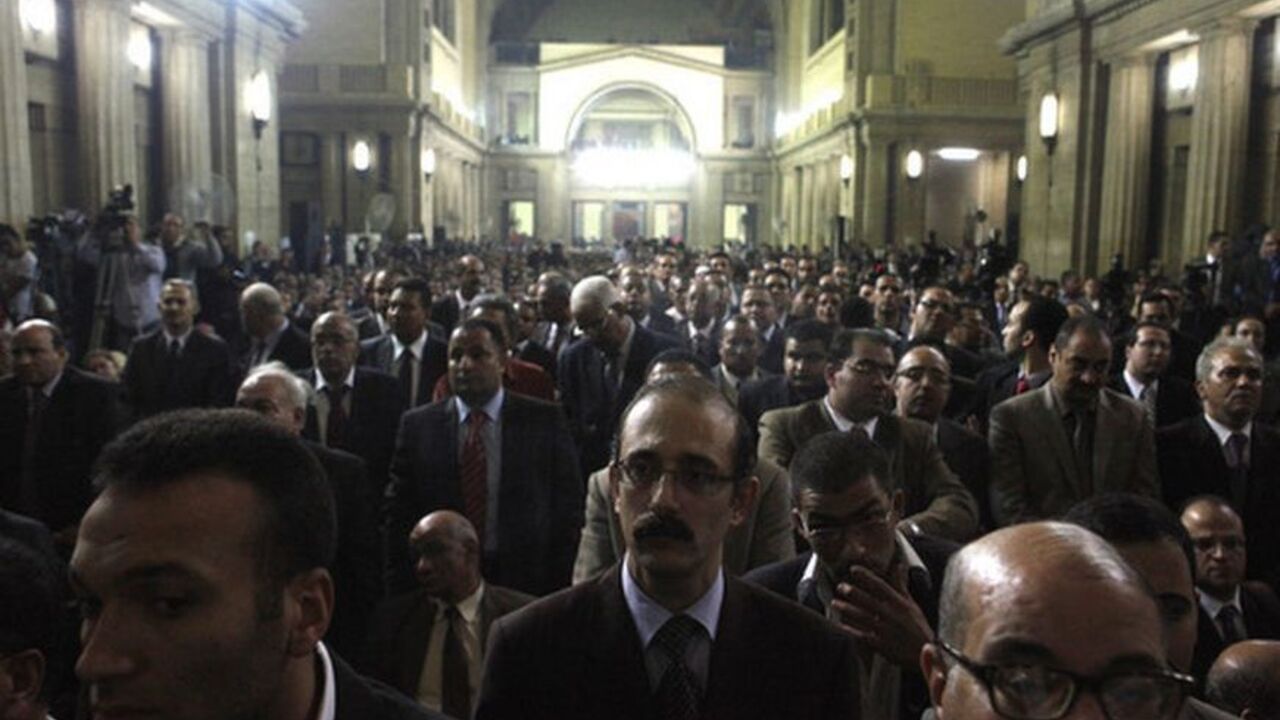 Judges attend a meeting at Egypt's Judges Club in Cairo Judges attend a meeting at Egypt's Judges Club in Cairo November 24, 2012. Egyptian President Mohamed Mursi faced a rebellion on Saturday from judges who accused him of expanding his powers at their expense, deepening a crisis that triggered calls for more protests following a day of violence across Egypt. REUTERS/Asmaa Waguih (EGYPT - Tags: POLITICS)