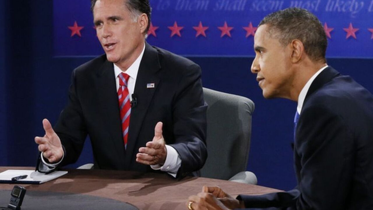 U.S. President Obama listens as Republican presidential nominee Romney speaks during the final presidential debate in Boca Raton U.S. President Barack Obama (R) listens as Republican presidential nominee Mitt Romney (L) speaks during the final U.S. presidential debate in Boca Raton, Florida October 22, 2012. REUTERS/Rick Wilking (UNITED STATES - Tags: POLITICS ELECTIONS USA PRESIDENTIAL ELECTION)