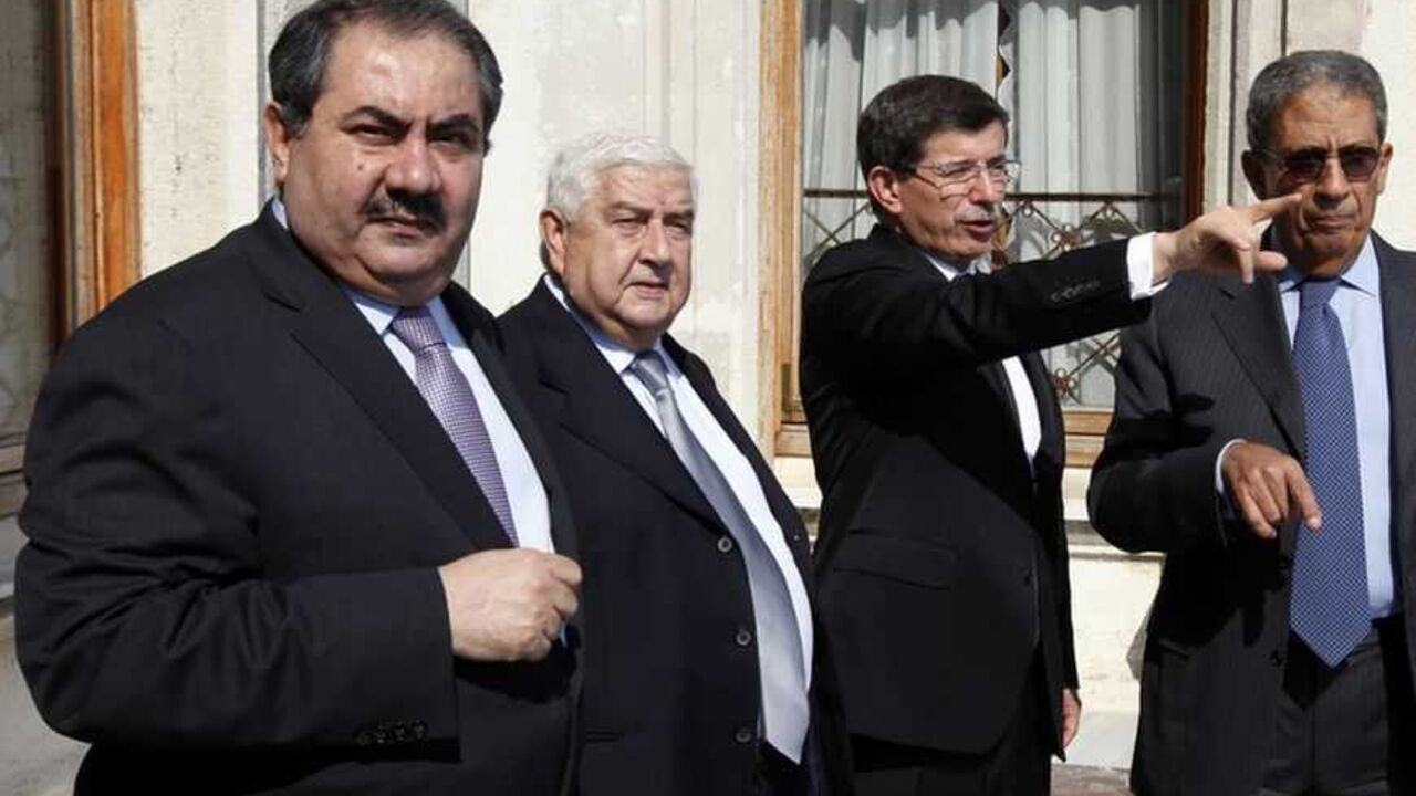 Foreign Ministers Zebari of Iraq, Al-Moualem of Syria and Davutoglu of Turkey and Secretary General of the Arab League Moussa chat before their meeting in Istanbul Foreign Ministers Hoshiyar Zebari of Iraq, Walid al-Moualem of Syria and Ahmet Davutoglu of Turkey, and Secretary General of the Arab League Amr Moussa (R) chat before their meeting at the Ottoman-era Ciragan Palace in Istanbul September 17, 2009. REUTERS/Osman Orsal (TURKEY POLITICS)