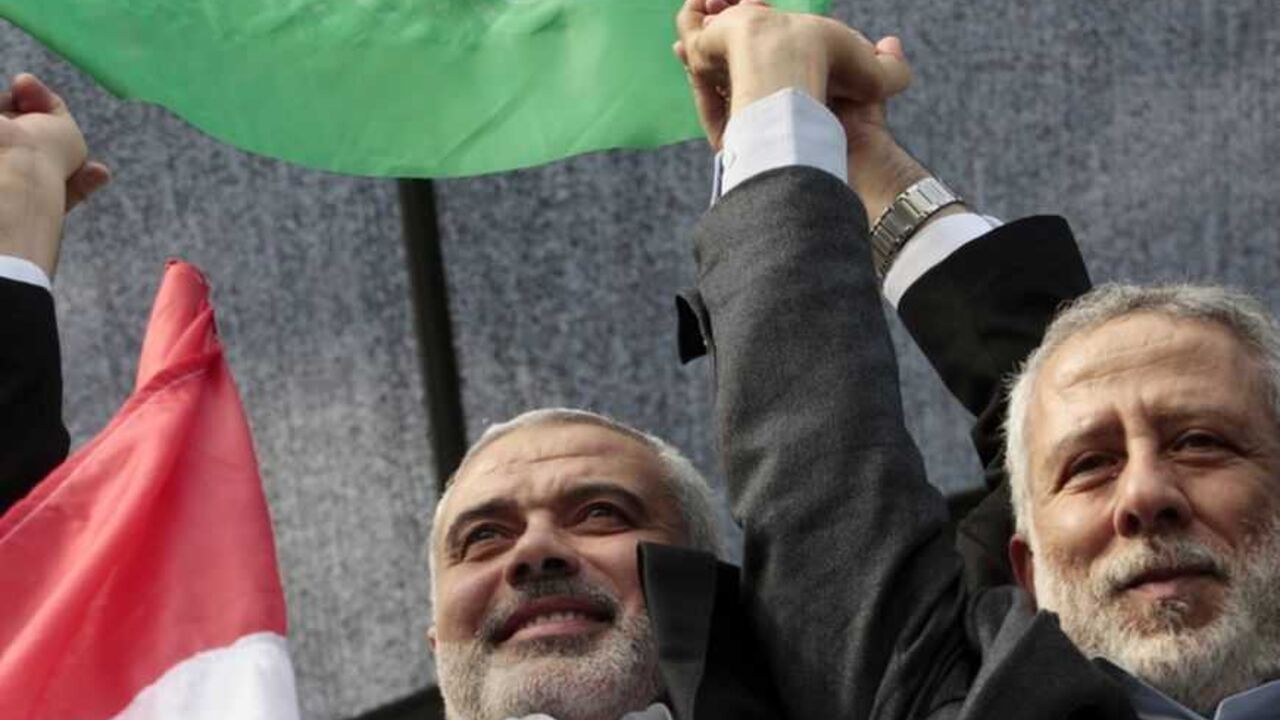 Senior Hamas leader Ismail Haniyeh and Islamic Jihad leader Mohammed Al-Hindi celebrate what Palestinians say is a victory over Israel after an eight-day conflict, during a rally in Gaza City Senior Hamas leader Ismail Haniyeh (L) and Islamic Jihad leader Mohammed Al-Hindi celebrate what Palestinians say is a victory over Israel after an eight-day conflict, during a rally in Gaza City November 22, 2012. A ceasefire between Israel and Gaza's Hamas rulers took hold on Thursday after eight days of conflict, although deep mistrust on both sides cast doubt on how long the Egyptian-sponsored deal can last. REUTERS/Ahmed Zakot (GAZA - Tags: MILITARY CONFLICT POLITICS)