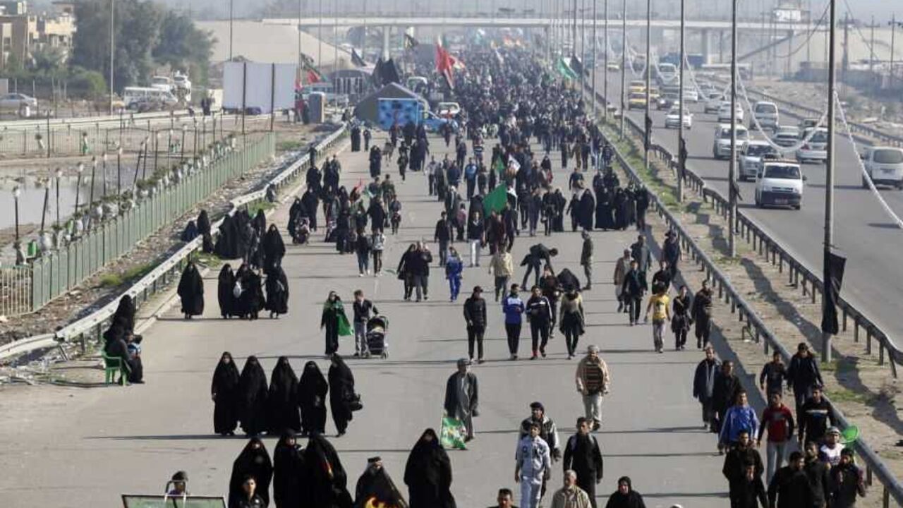 Iraqi Shiite Muslim pilgrims walk to the holy city of Kerbala to mark Arbain in Baghdad Iraqi Shiite Muslim pilgrims walk to the holy city of Kerbala to mark Arbain in Baghdad's Doura District December 31, 2012. REUTERS/Saad Shalash (IRAQ - Tags: RELIGION)